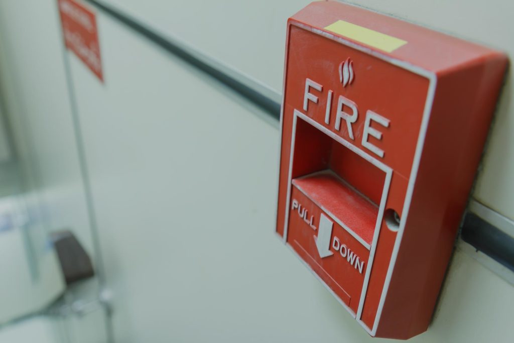 Close-up of a red fire alarm box with 